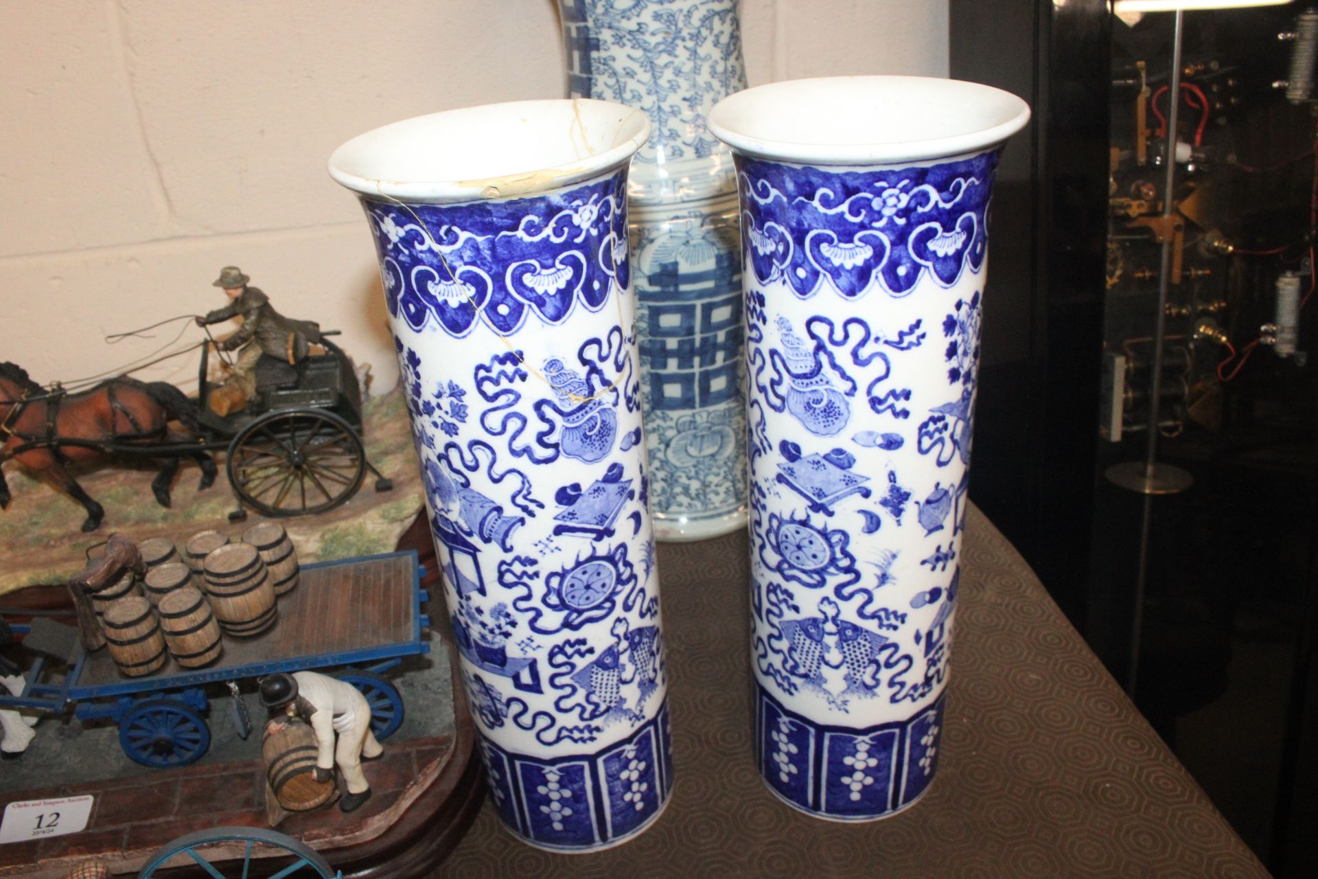 A Chinese blue and white garniture of vases compri - Image 6 of 13