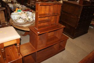 An oak graduated shelving unit and a pine hanging