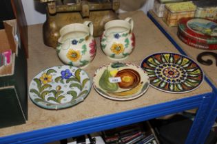 Two Wedgwood jugs and Continental pottery plates