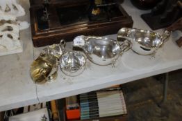 A pair of silver plated sauce boats, silver plated