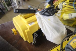 A portable 12 volt winch with instruction guide an