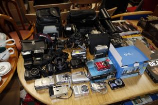 A collection of vintage and other cameras and acce