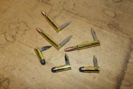 Six brass bullet penknives (93)