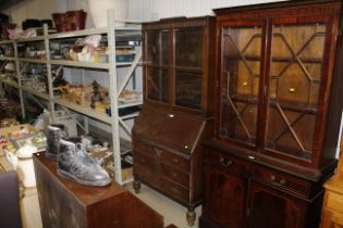 An oak and glazed bureau bookcase