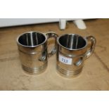 Two mugs in the form of pistons (137) (138)