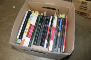 A box of Classic Car auction catalogues