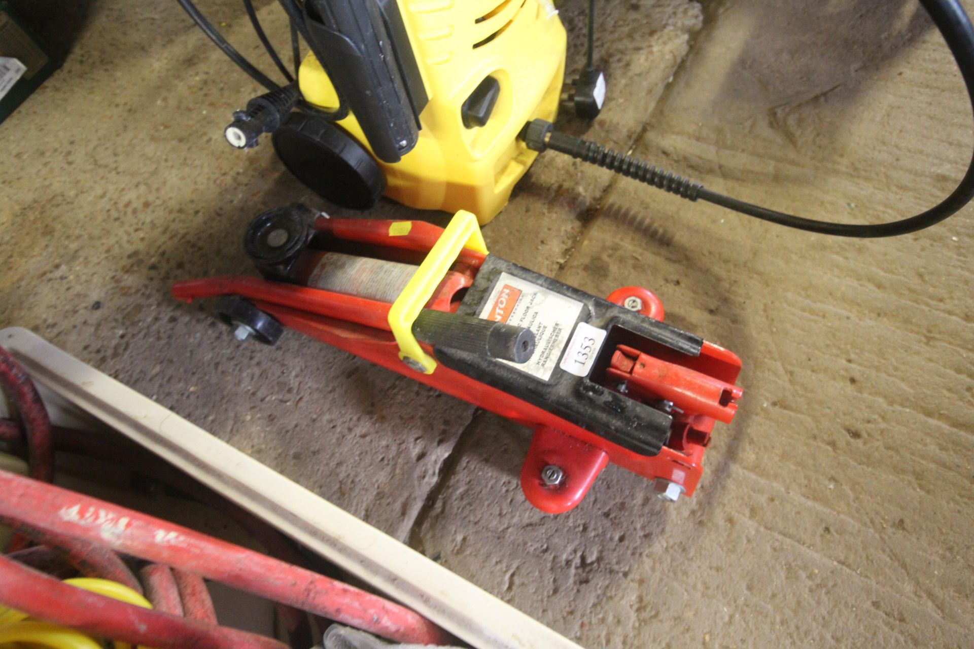 A Benton hydraulic trolley jack