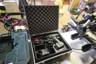 A Bosch X-CELPSB18 18 volt cordless drill with two