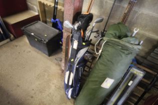 A Ping golfing bag and contents of clubs including