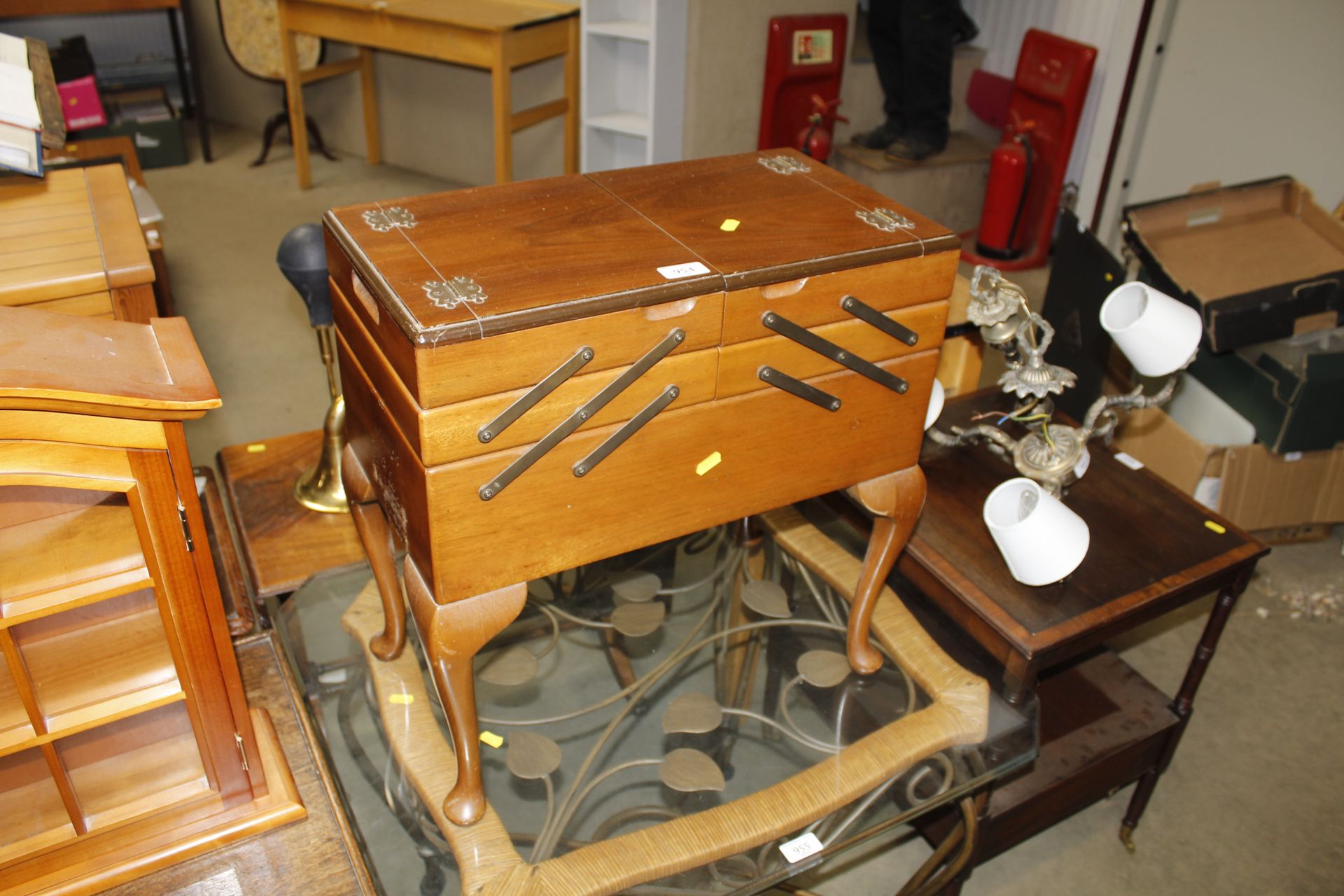 A cantilever sewing box and part contents