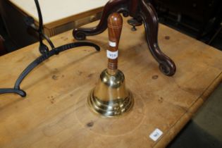 A brass hand bell (99)