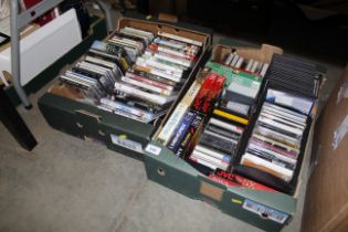 Two boxes containing cassette tapes, video tapes,