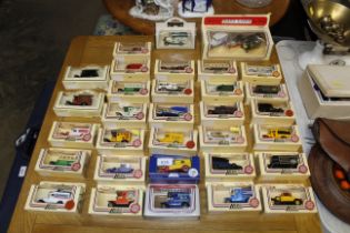 A collection of boxed die-cast model vehicles