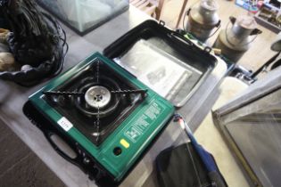 A SunnGas portable gas stove in fitted plastic cas