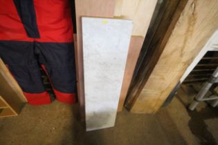 A marble slab measuring approx. 12" x 43" x 1"