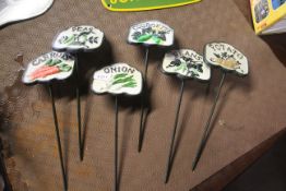 Six cast iron painted vegetable markers (202)