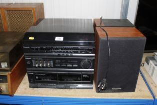 A Panasonic Hi--Fi and a pair of speakers