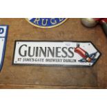 A reproduction Guinness advertising sign (183)