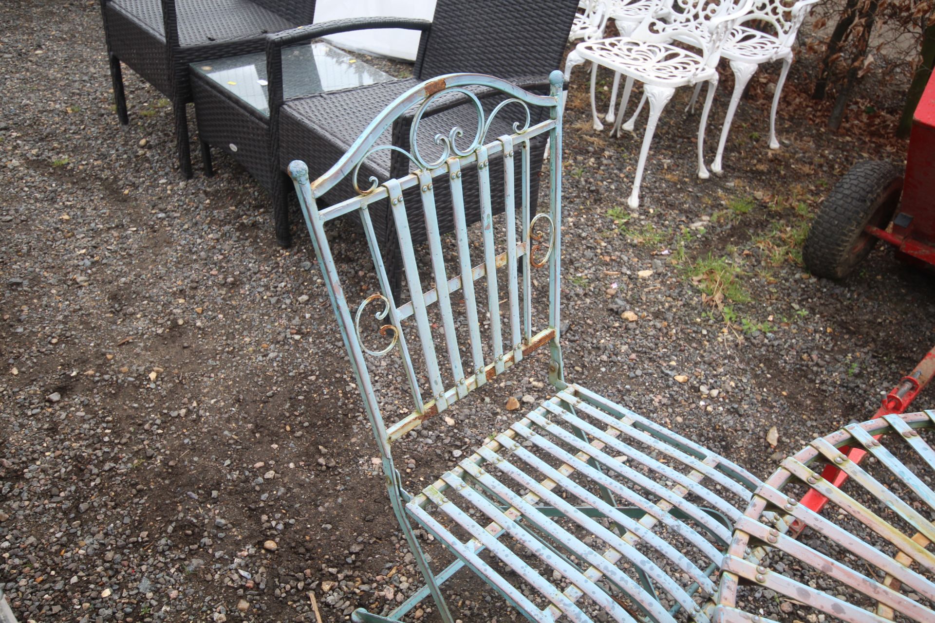 An ornate folding metal bistro table and pair of m - Image 2 of 4