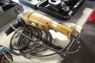 A DeWalt DW831L 110 volt angle grinder