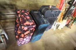 Three travel suitcases