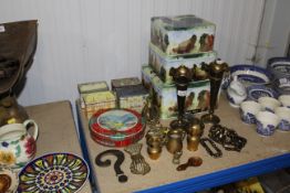A collection of various brass ware and advertising