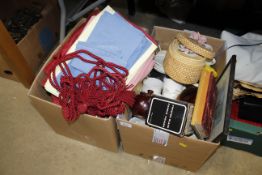 Two boxes containing curtains, books and various g