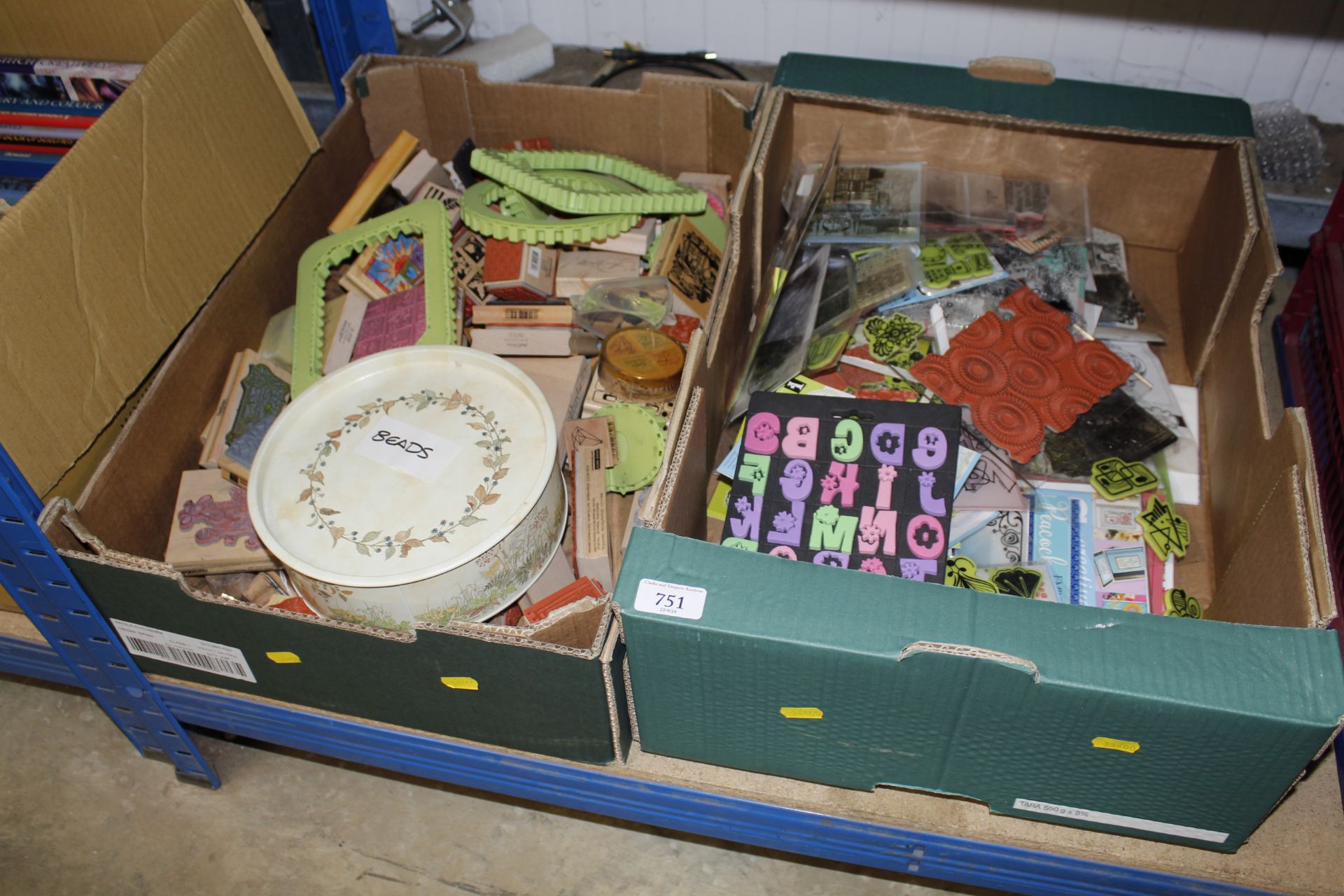 Two boxes of various rubber stamps and craft items