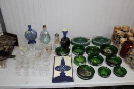 A collection of various table glass ware and adver