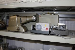 A Leitz projector; a Rank Moth projector and an Al