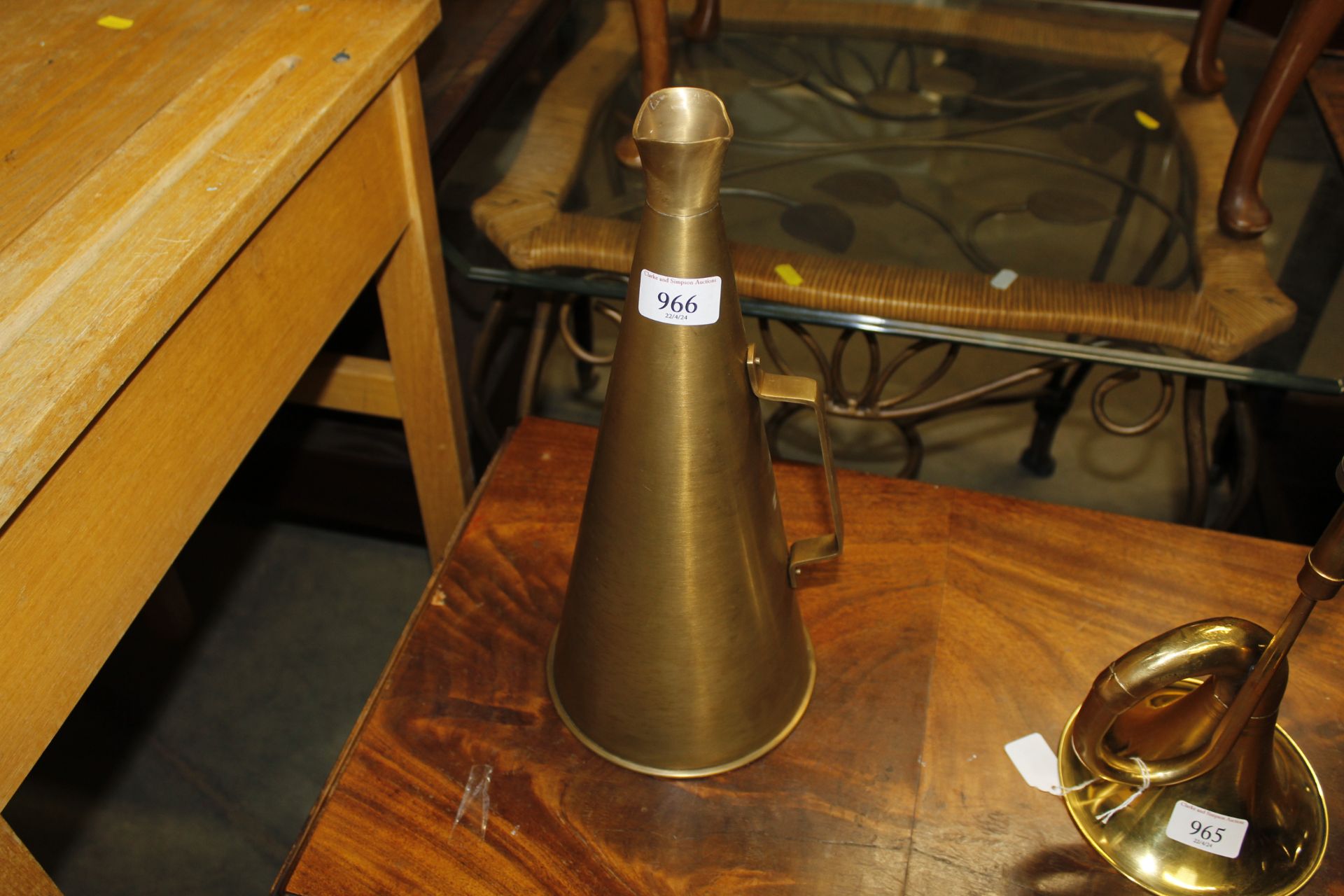 A brass megaphone (80)