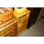 A modern cupboard fitted single drawer