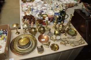A collection of brass and copper to include candle