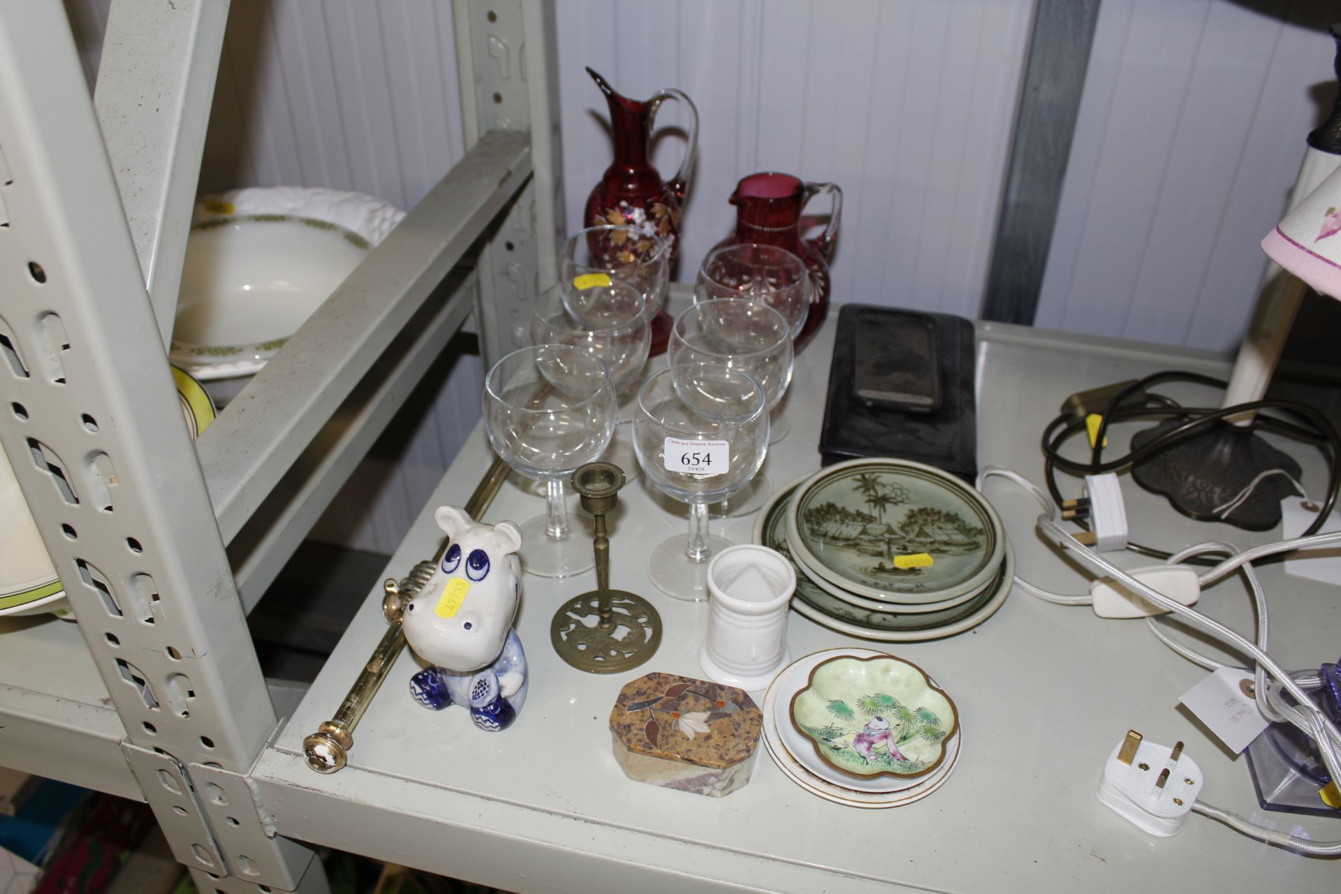 A collection of glassware to include Cranberry jug