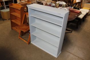 A set of painted pine shelves