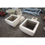 A pair of large painted concrete three sectional u