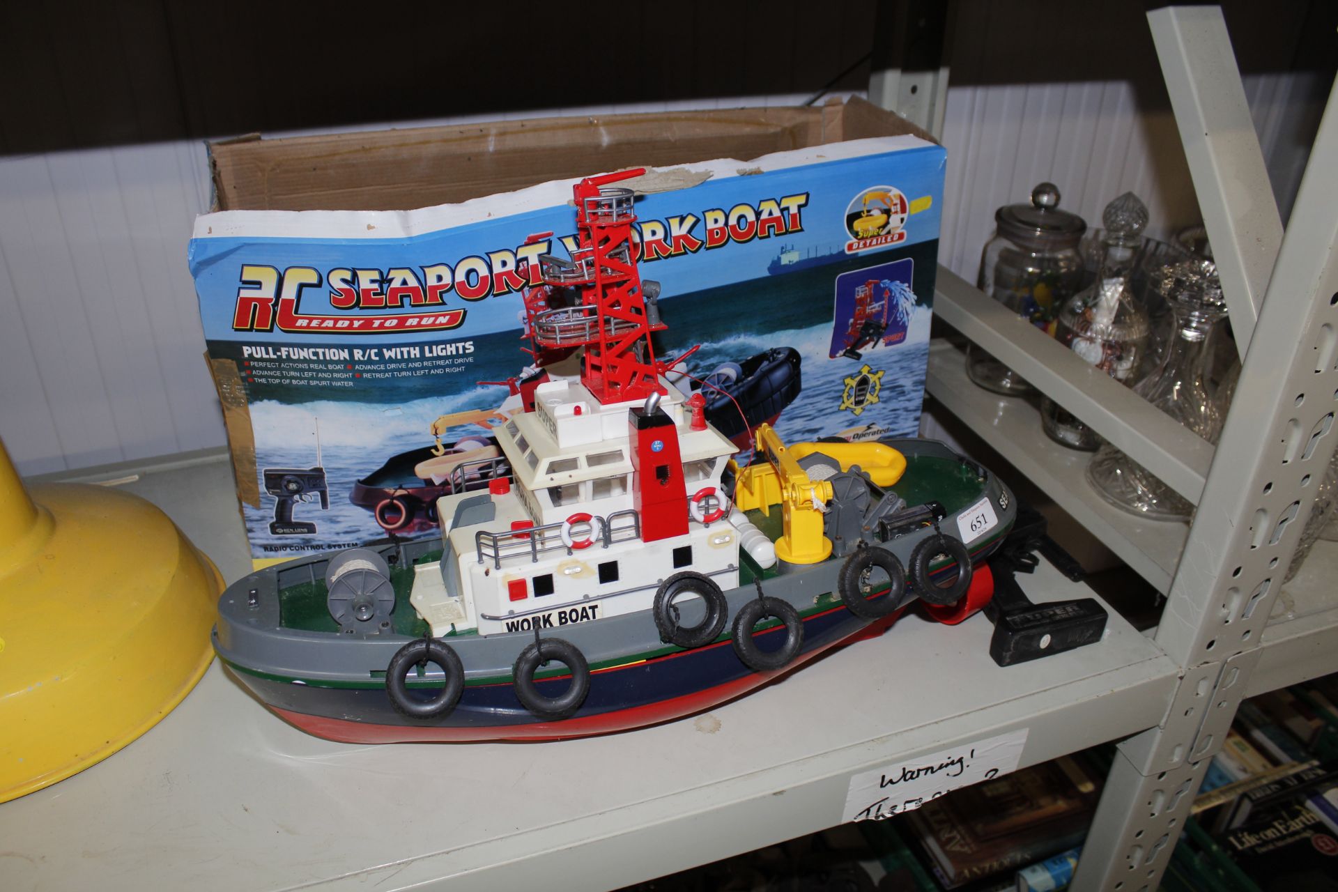 A radio controlled Seaport workboat
