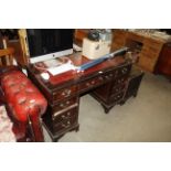 A reproduction mahogany twin pedestal writing desk