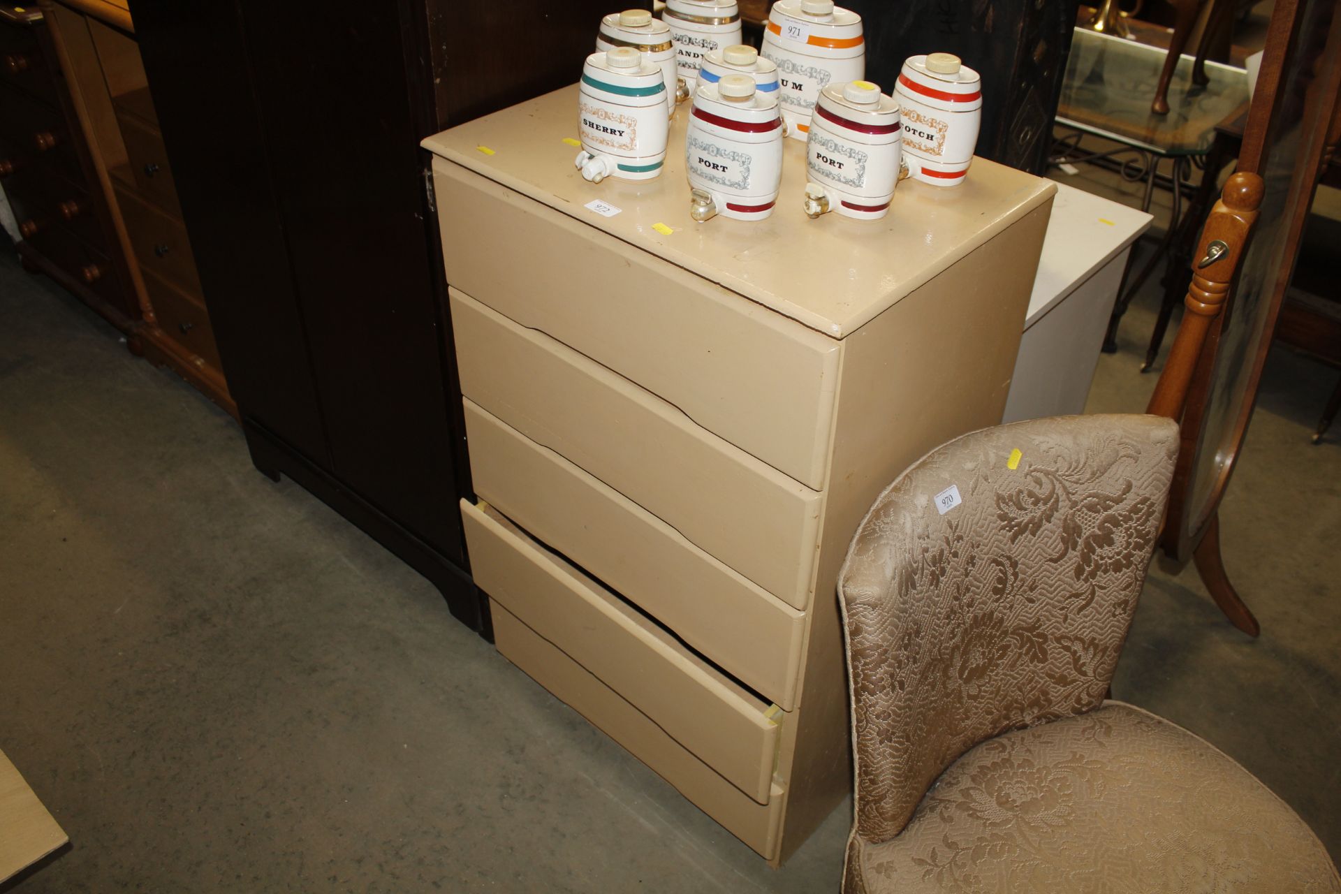 A painted wooden chest fitted four drawers