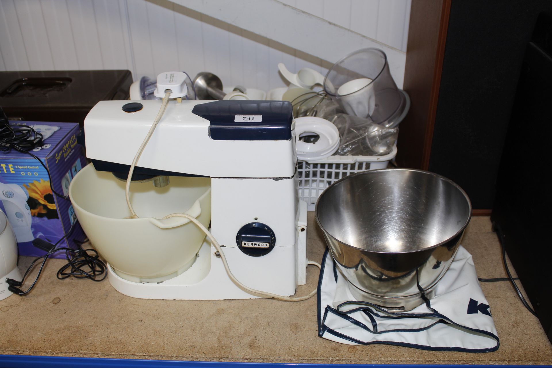 A Kenwood Chef mixer and various attachments