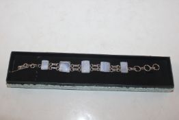 A 925 silver and blue agate set bracelet