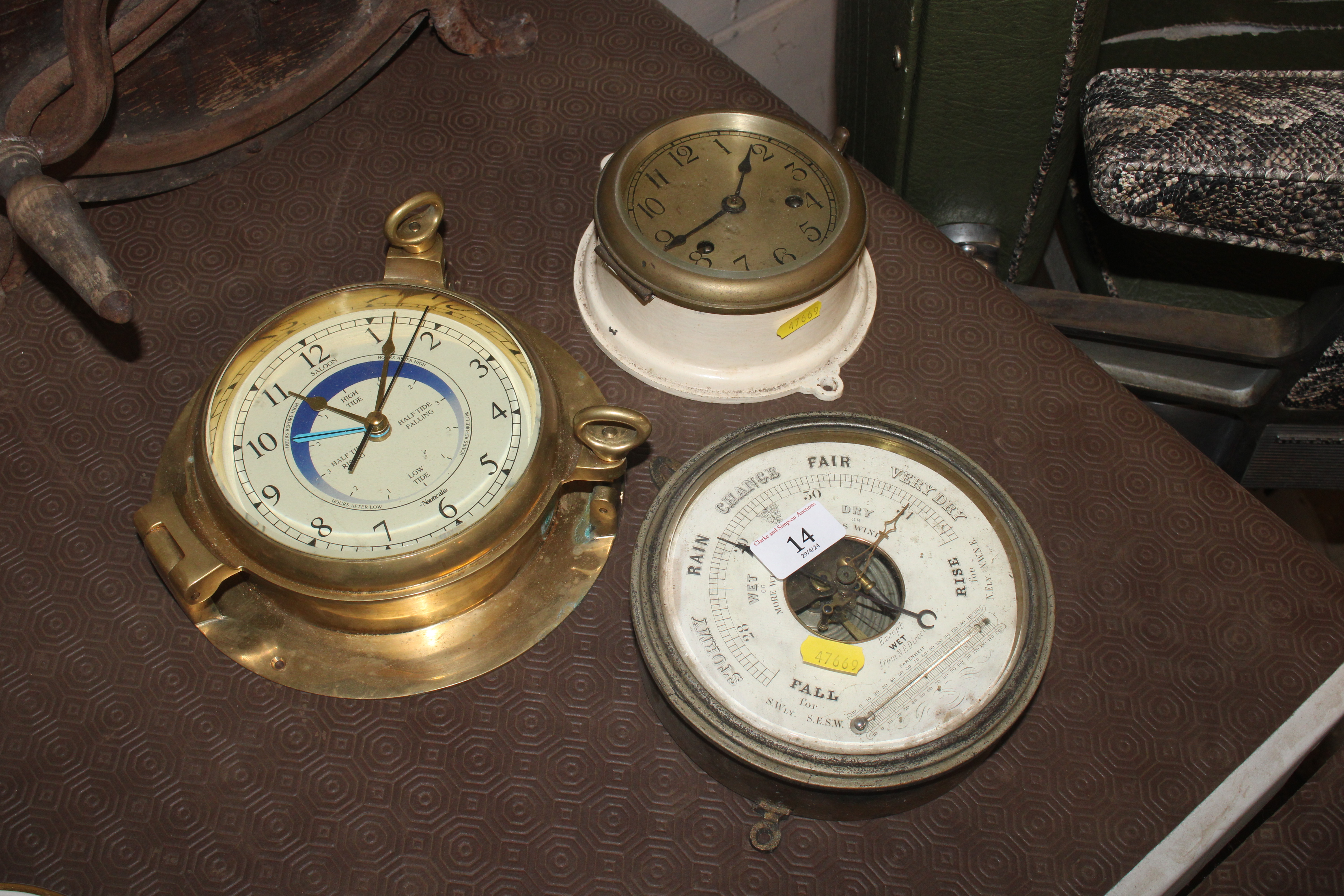 A brass cased ship's style saloon clock by Nautica