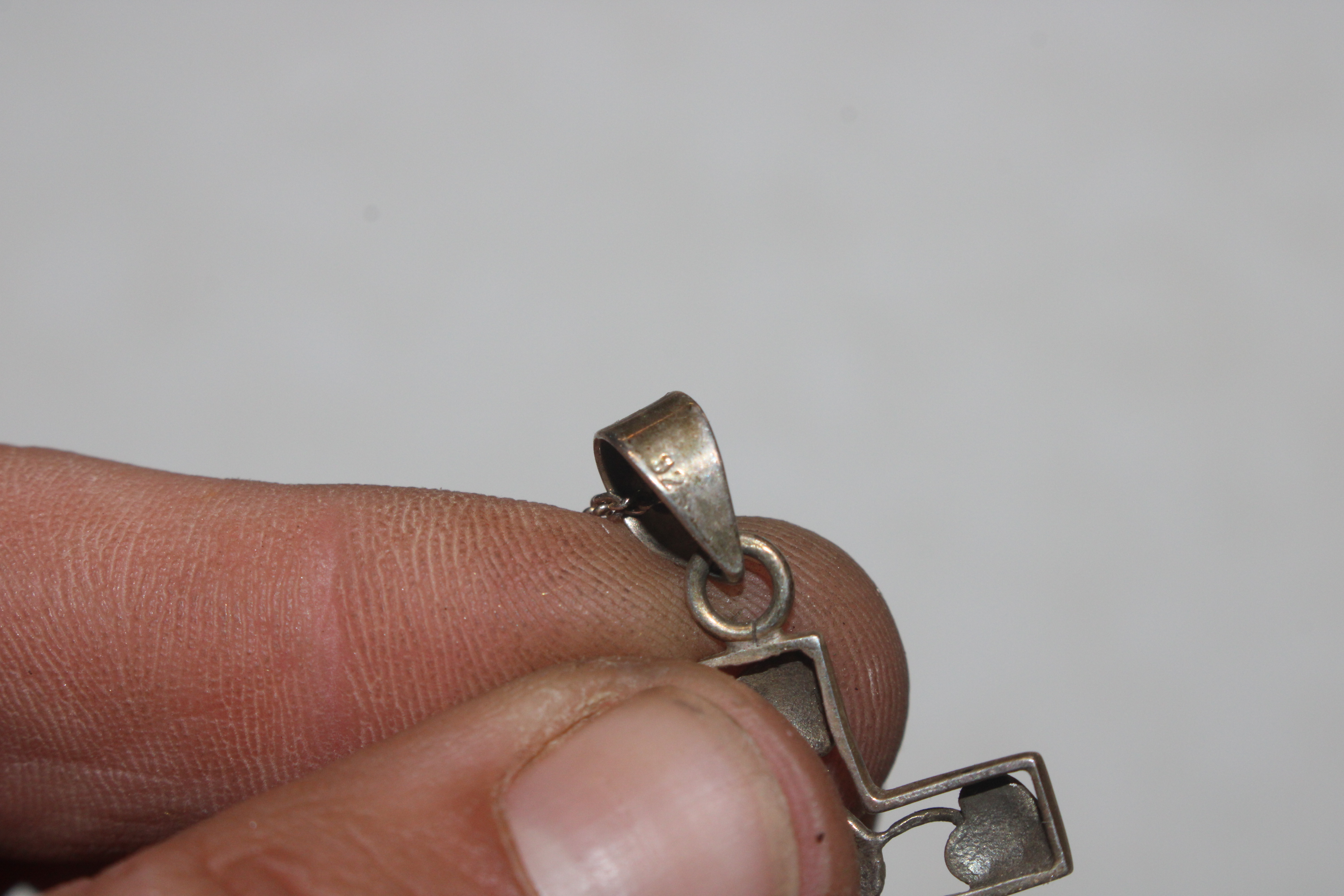A box containing 9ct gold mounted pendant; a silve - Image 34 of 50