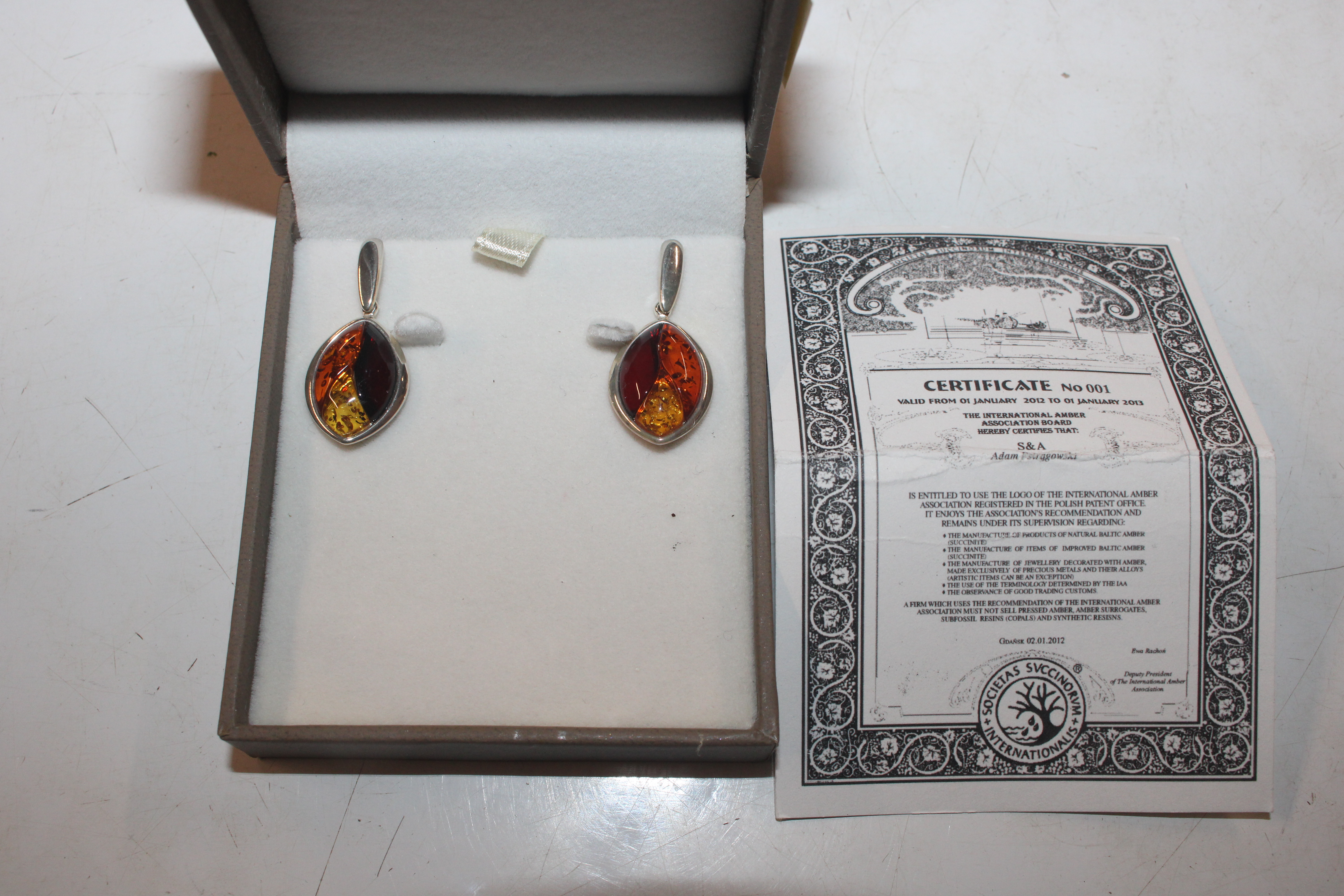 A pair of Sterling silver and amber set drop ear-r