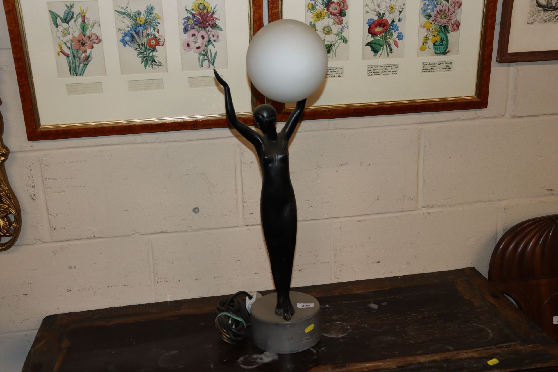 An Art Deco design figural table lamp