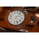 An American style wall clock with Roman numeral di