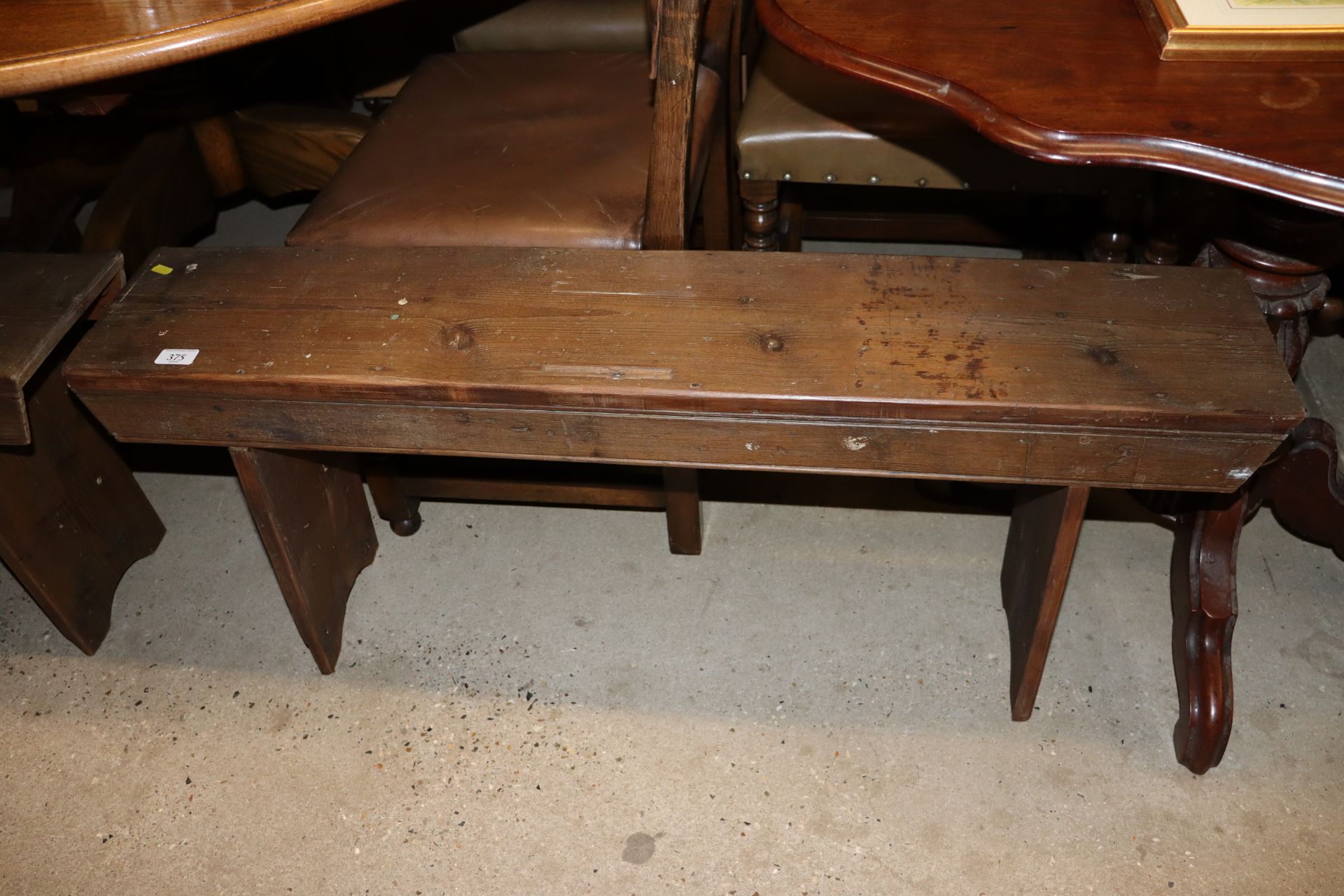 An antique pine bench