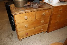 A stripped pine chest of two short and two long dr