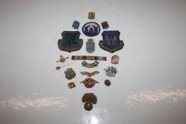 A box of military related and other cloth badges