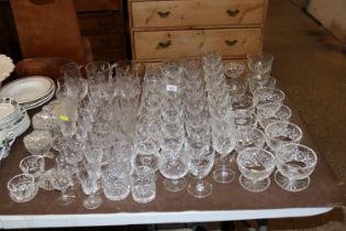 A collection of various cut glass table ware inclu